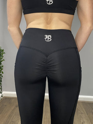 Black scrunch bum leggings with pockets - bum view