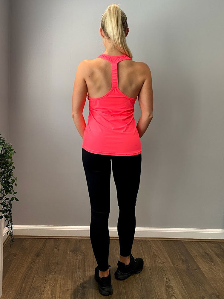Neon pink racer back fitness vest